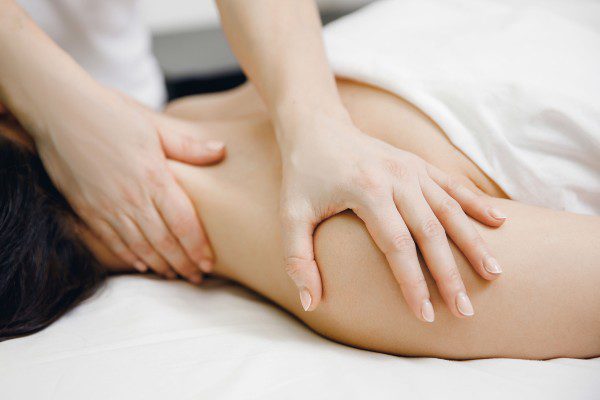 Deep Tissue Massage stretch on shoulder