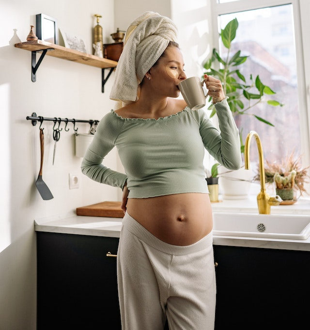 Pregnant Lady Dinking A Mug Of Tea