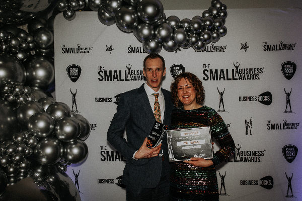 Rebecca And David Jones Holding The Award