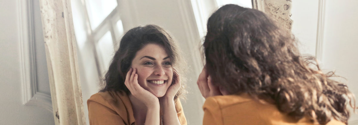 Lady Looking In Mirror