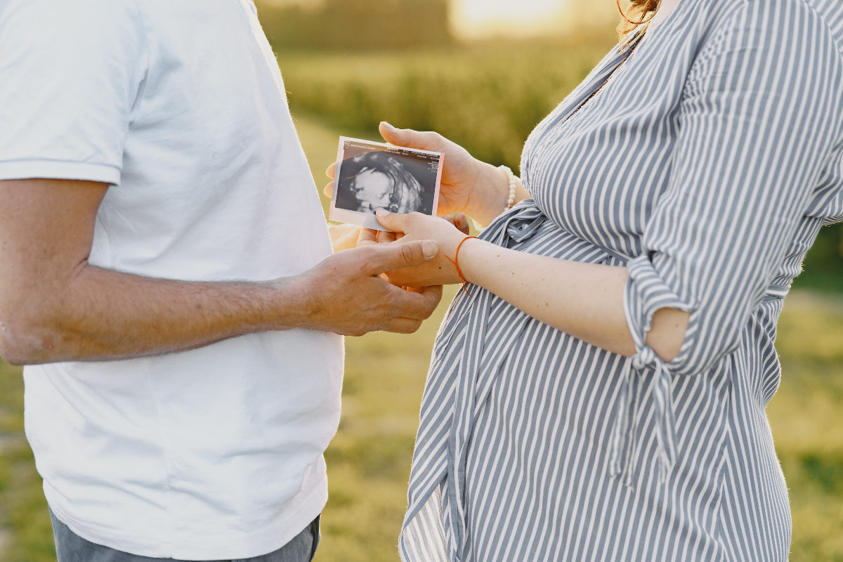 Parents To Be Holding Baby Image